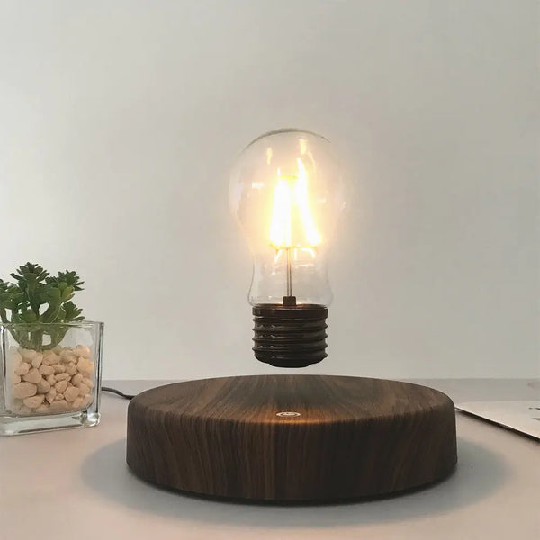 Levitation bulb lamp on a table in the on position. 