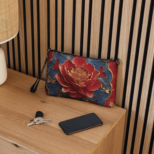 Oriental Cross Body Bag on a side table with cell phone and keys