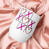 XOXO wine tumbler on satin fabric